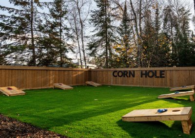 The Back Yard 3 lane cornhole area.