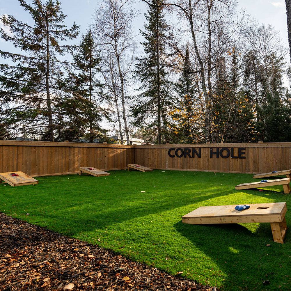 The Back Yard 3 lane cornhole area.