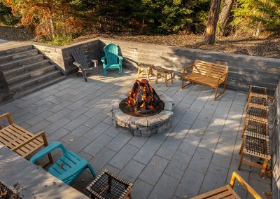 Fire pit in sunken brick patio area