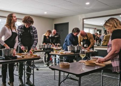 An instructor conducts a cooking class at The Hotel at Falcon Lake